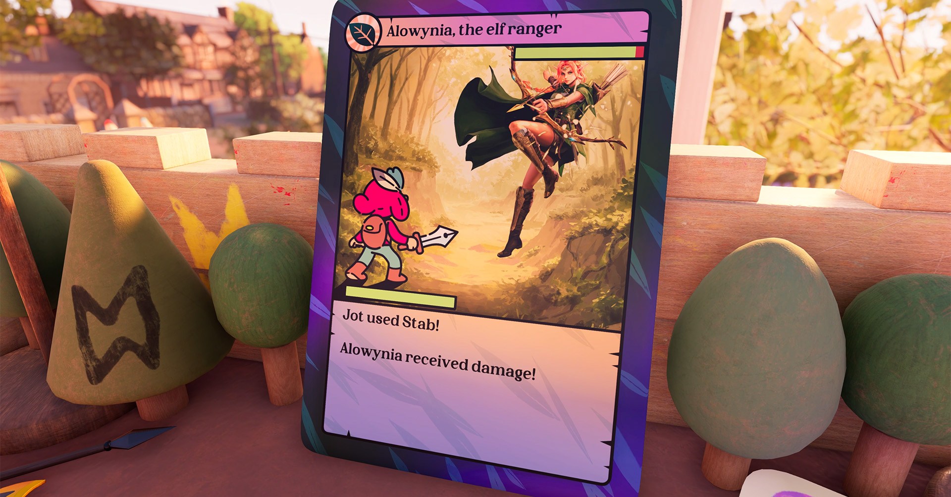 Jot appears on a Magic-style trading card engaged in a Pokemon-style battle with “Alowynia, the elf ranger.” Around the card are wooden blocks and toy trees in 3D